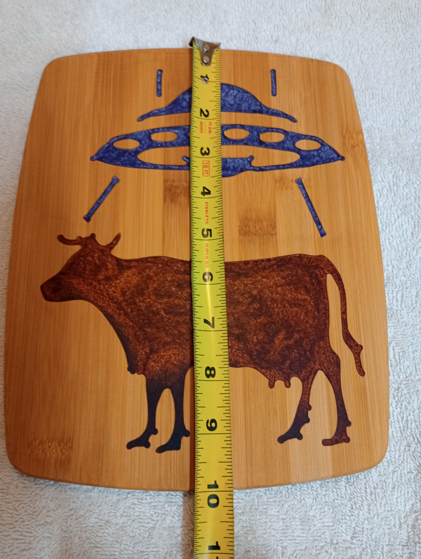 Bamboo cutting board with food grade epoxy inlays - cow abduction