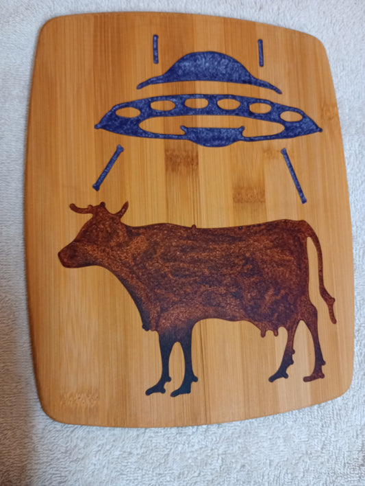 Bamboo cutting board with food grade epoxy inlays - cow abduction
