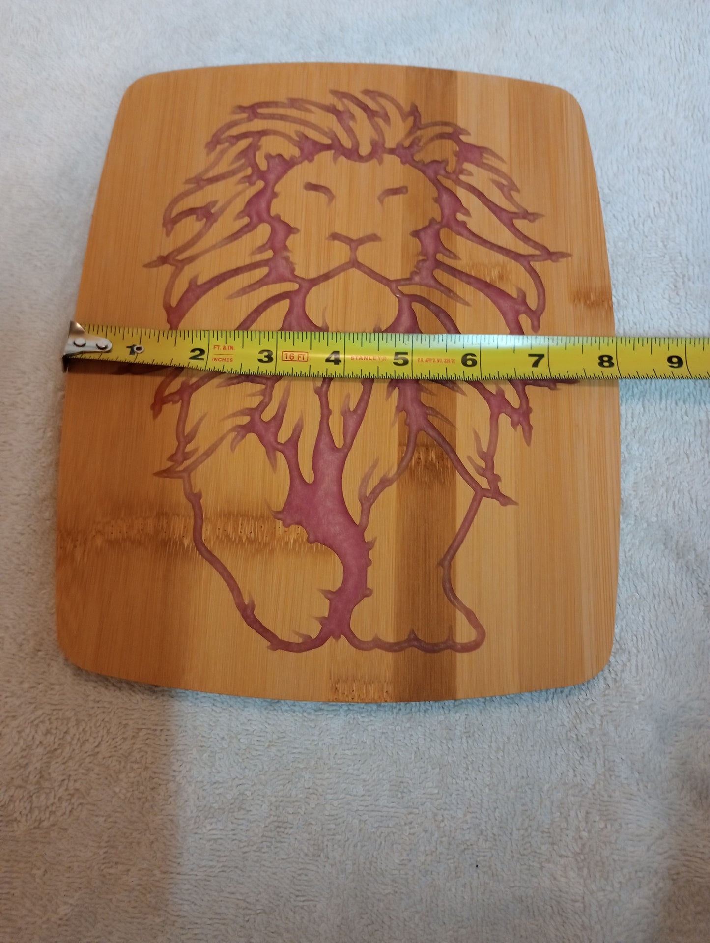 Bamboo cutting board with food grade epoxy inlays - Lion