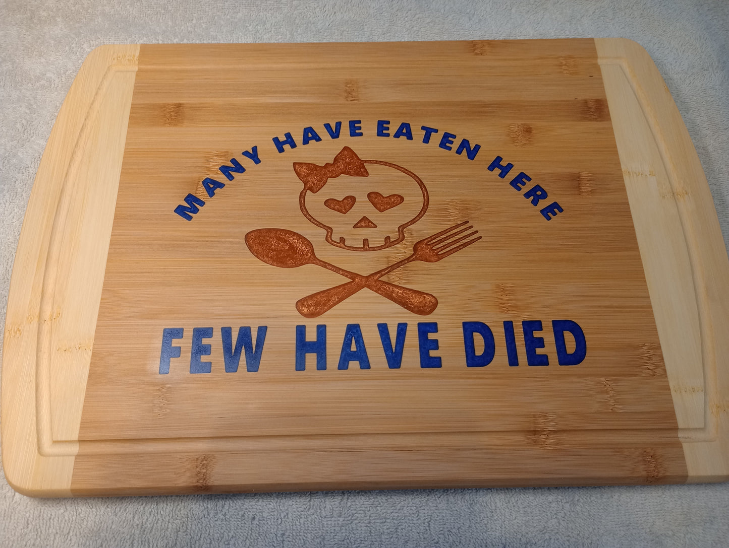 Bamboo cutting board with food grade epoxy inlays - many have eaten