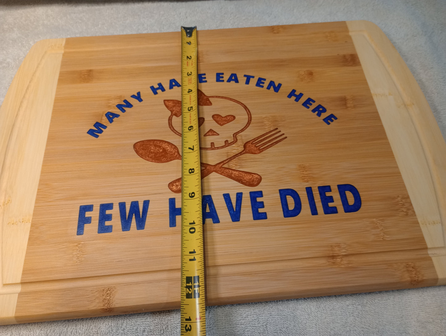 Bamboo cutting board with food grade epoxy inlays - many have eaten