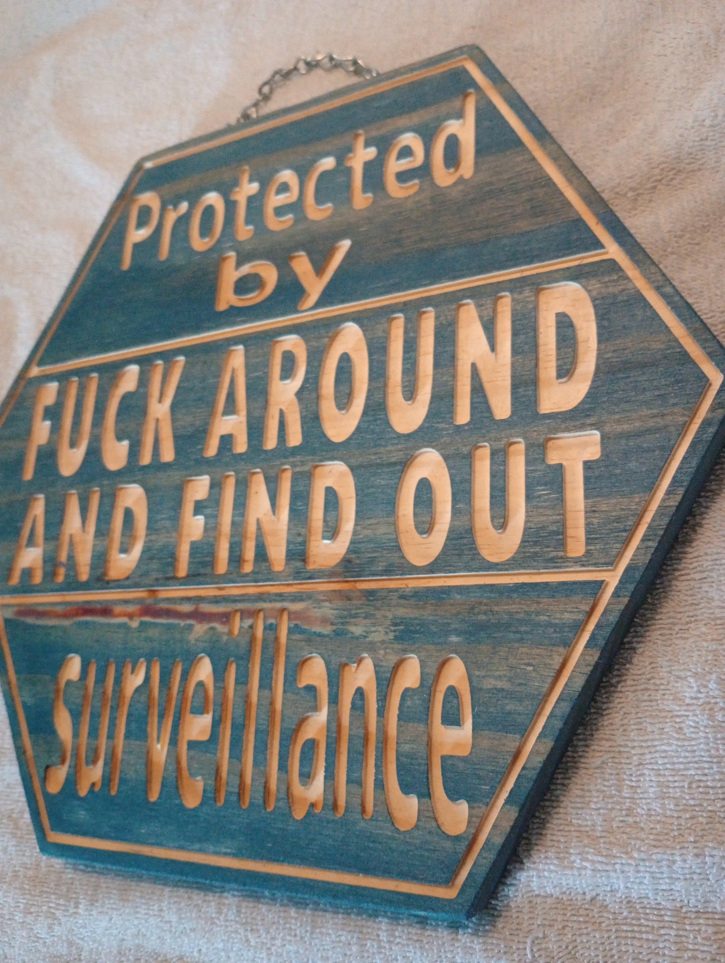 FAFO octagon sign - stained weathered blue