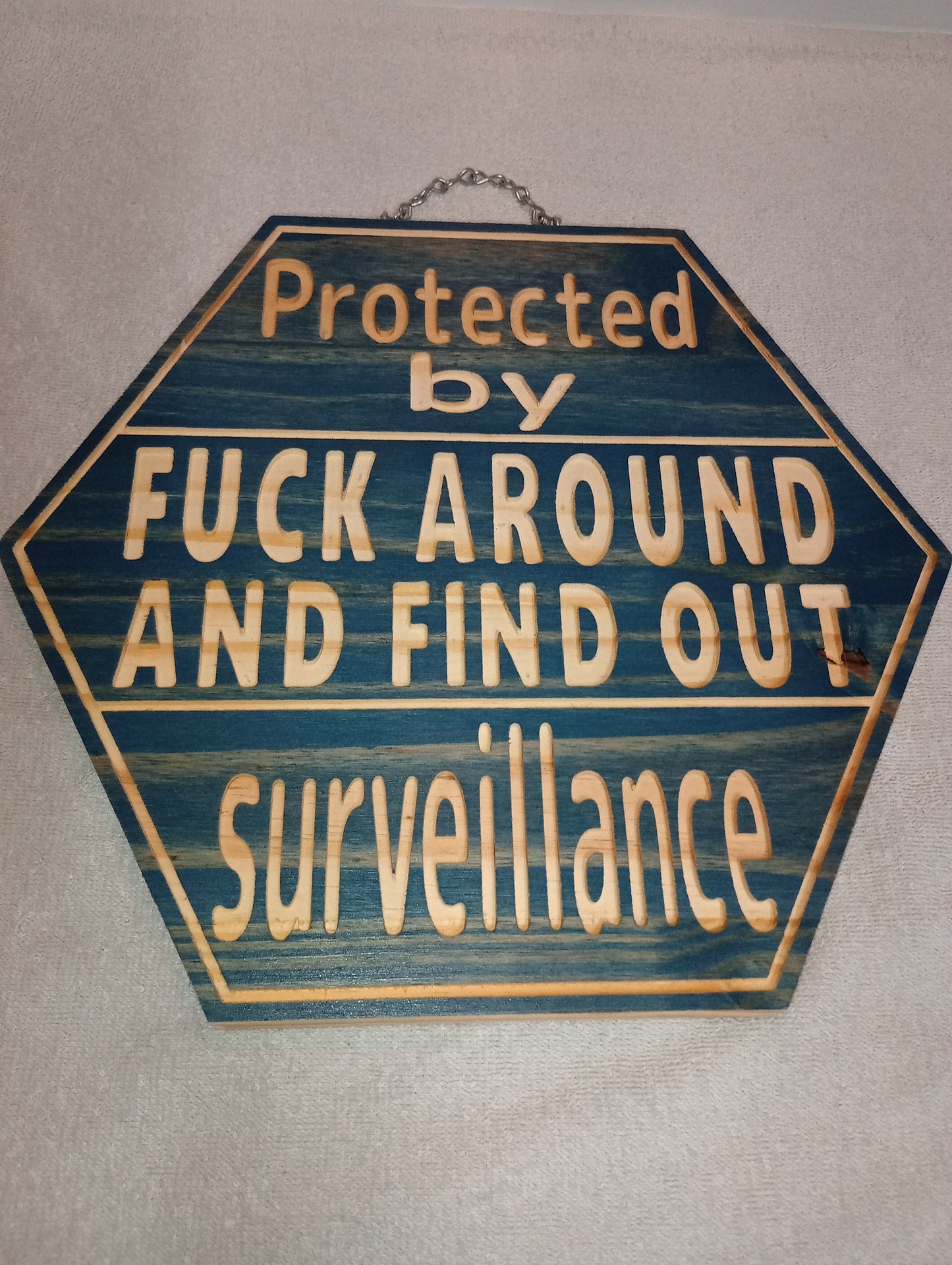 FAFO surveillance sign - weathered barn blue.