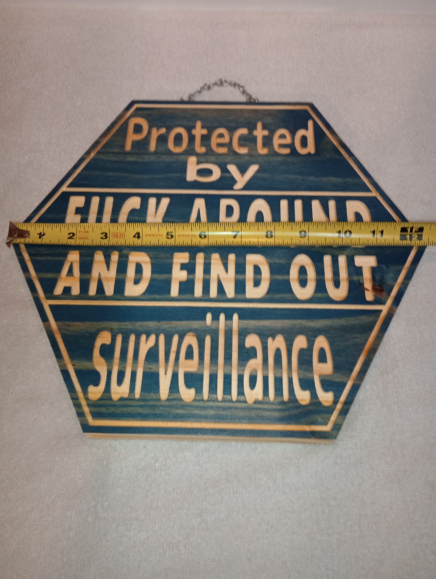 FAFO surveillance sign - weathered barn blue.